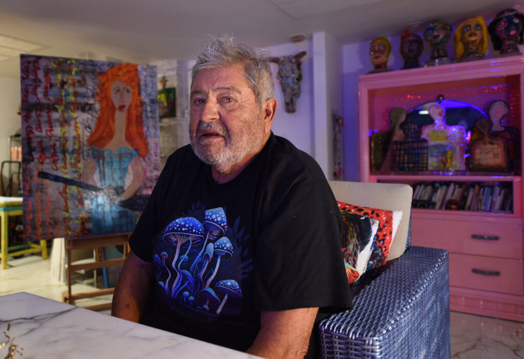 Portrait of Humberto Poidomani, an artist battling nephropathy, passionately painting from his home in Miami.