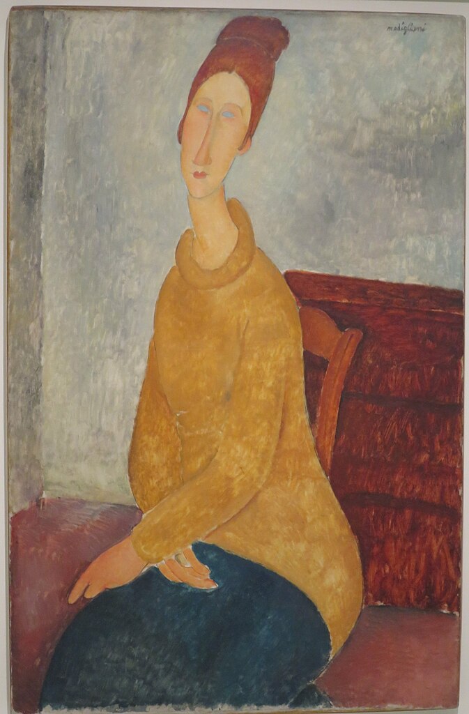 Portrait of Jeanne Hébuterne in a yellow sweater by Amedeo Modigliani, featuring her signature elongated face and simplified forms.