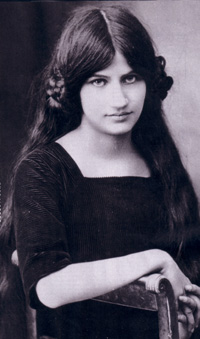 Portrait of Jeanne Hébuterne, a French artist and the muse of Amedeo Modigliani, with her characteristic elongated features and serene expression.